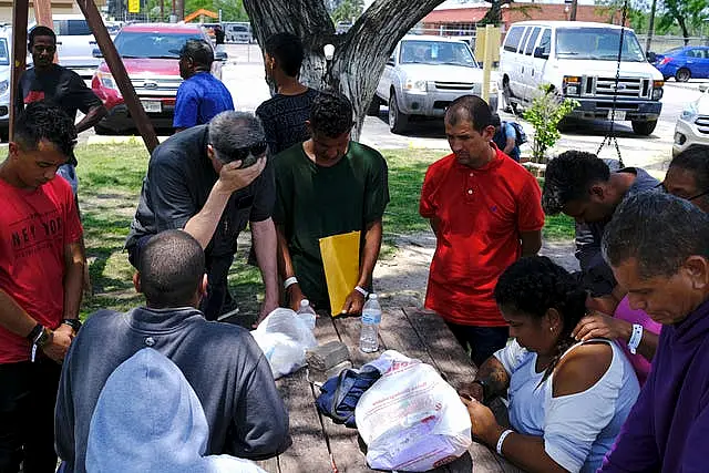 People pray following the incident 