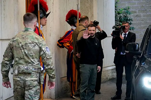 Ukrainian President Volodymyr Zelensky leaves after meeting Pope Francis at the Vatican 