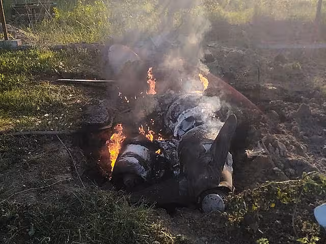 Fragments of a Russian rocket shot down by Ukraine’s air defence system are seen after a night rocket attack in the Kyiv region
