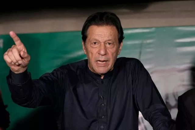 Imran Khan points to the right