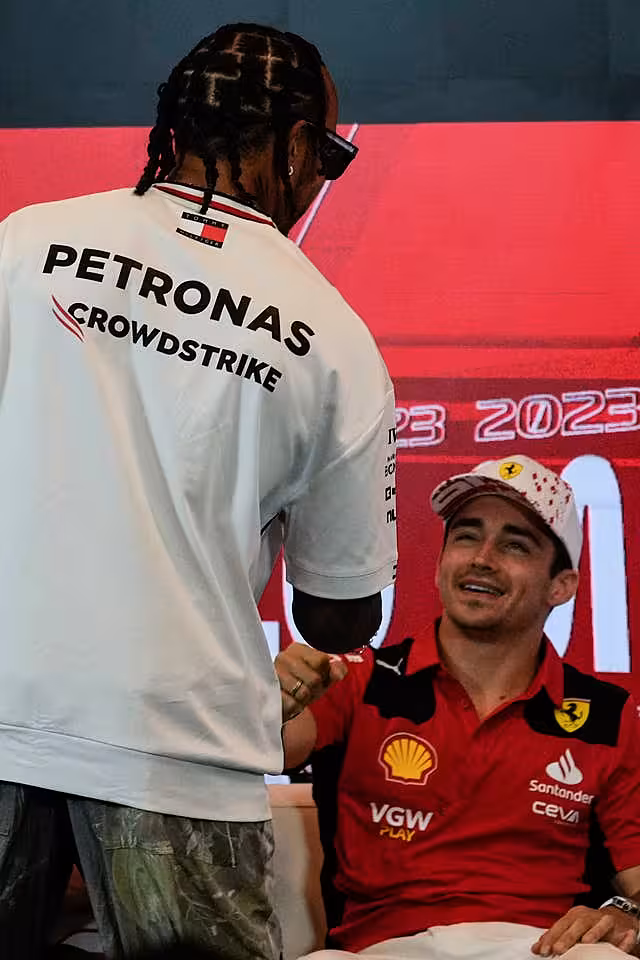 Lewis Hamilton (left) and Charles Leclerc