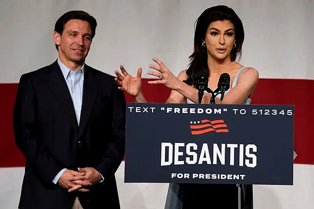 Republican presidential candidate Florida governor Ron DeSantis listens to his wife Casey speak during a campaign event, Tuesday, May 30, 2023, in Clive, Iowa