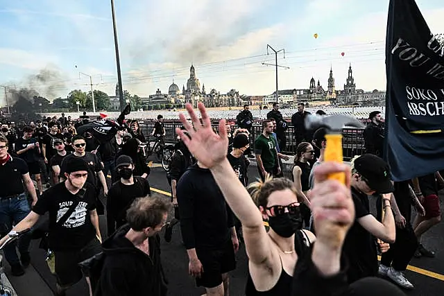 Participants of a left-wing demonstration gather in Dresden