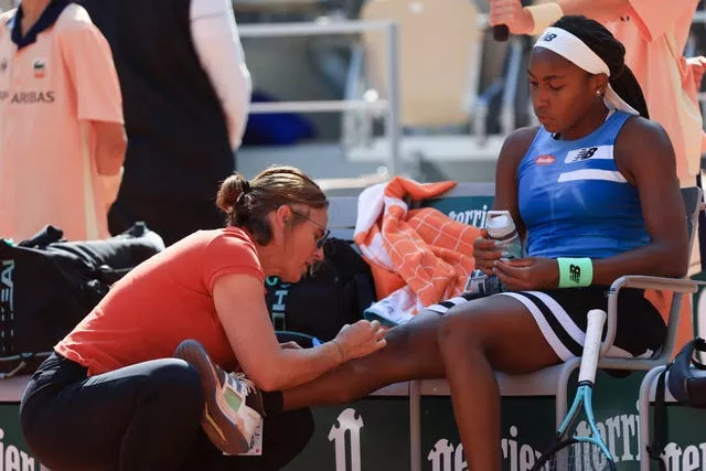 Coco Gauff has her knee patched up after falling