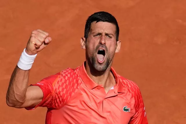 Novak Djokovic clenches his fist during his win over Carlos Alcaraz