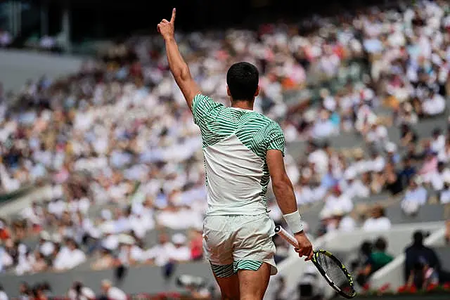 Carlos Alcaraz celebrates his remarkable second-set winner