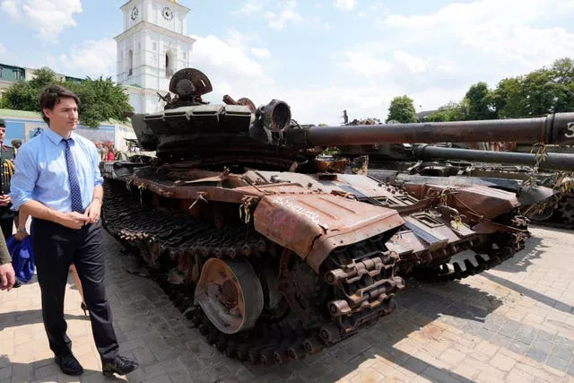 Justin Trudeau and a tank