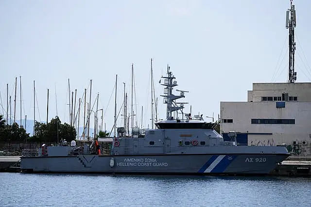 A Greek coastguard vessel docked at the port in Kalamata town 