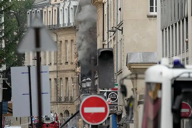 Smoke billows from a building in Paris 