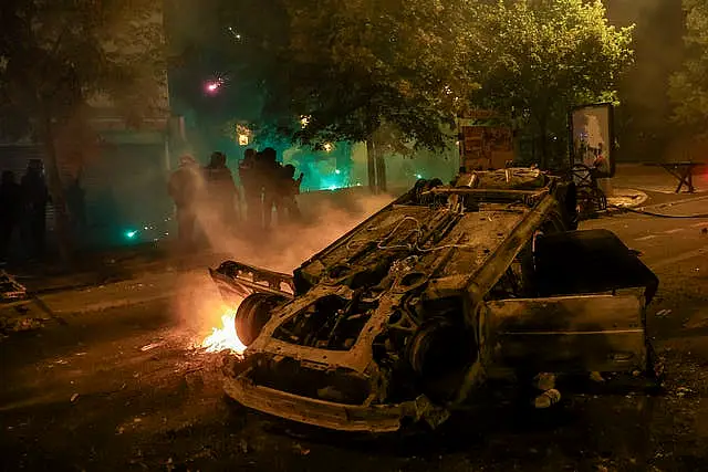 A can burns in the Paris suburb of Nanterre