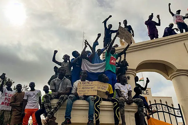 Supporters of Niger’s ruling junta gather at the start of a protest called to fight for the country’s freedom and push back against foreign interference in Niamey, Niger