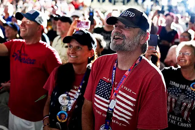 Supporters of Donald Trump attend a campaign rally for the former US president