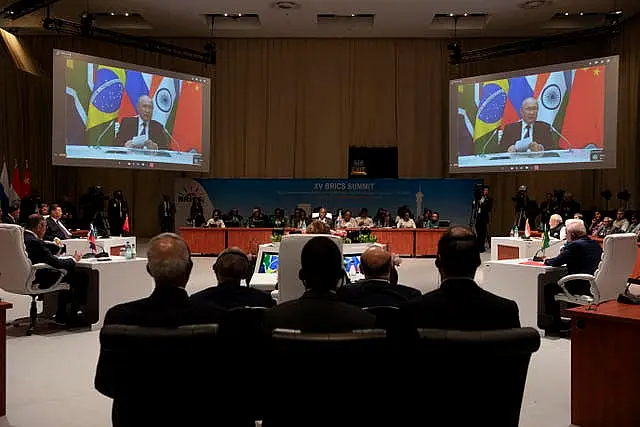 Russian President Vladimir Putin addresses the Brics summit via video link, in Johannesburg, South Africa