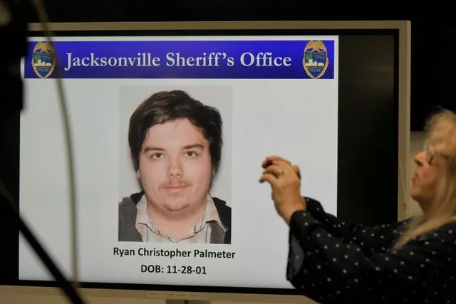 A photograph of Ryan Christopher Palmeter is shown on a video monitor during Sheriff TK Waters’ press conference at the Jacksonville Sheriff’s Office headquarters building in Jacksonville, Florida