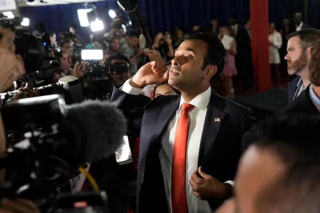 Vivek Ramaswamy talks with reporters after the debate