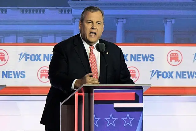 Former New Jersey governor Chris Christie speaks during a Republican presidential primary debate in Milwaukee