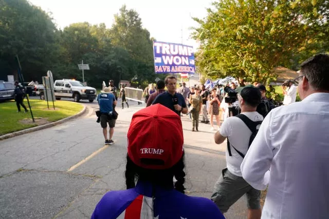 Supporters of Donald Trump gather outside Fulton County Jail