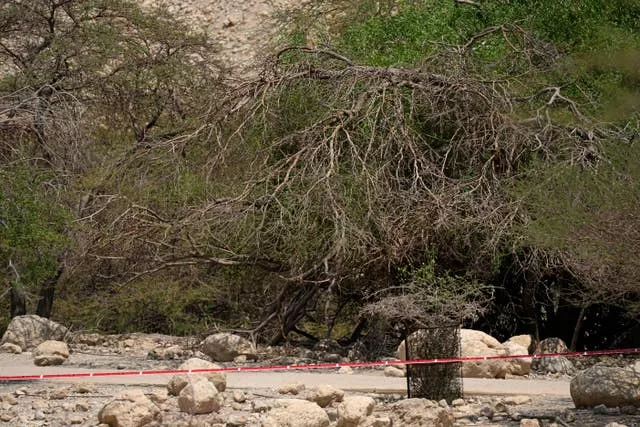 Crime scene tape blocks access to the site of a rockslide that took place in the Ein Gedi Nature Reserve, on the western shore of the Dead Sea, a popular tourist site in Israel