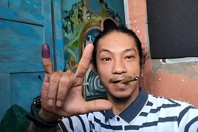 Burmese hip-hop artist Byu Har takes a selfie photo in Yangon, Myanmar, in 2020