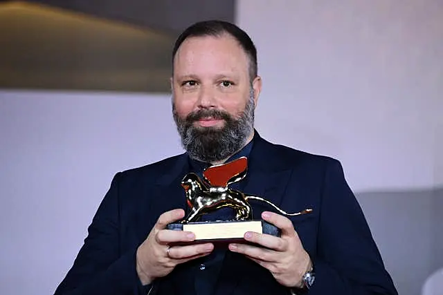 Greek director Yorgos Lanthimos with the Golden Lion award for the best film Poor Things after the closing ceremony for the 80th edition of the Venice Film Festival in Italy 