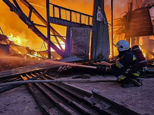 Firefighters working after a Russian attack in Lviv on Tuesday