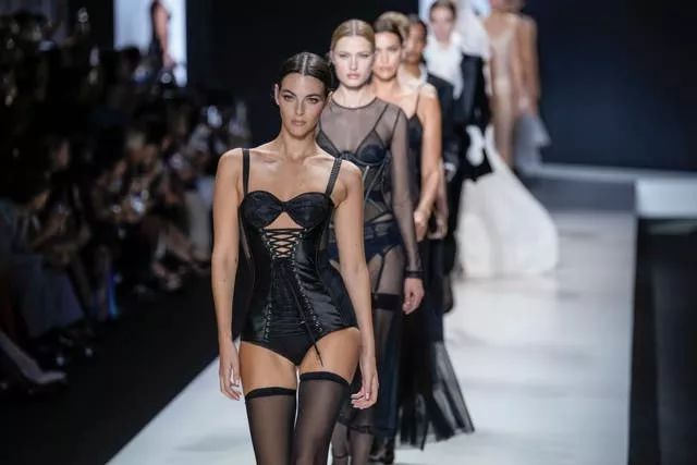 Naomi Campbell wears black lingerie on Dolce and Gabbana catwalk