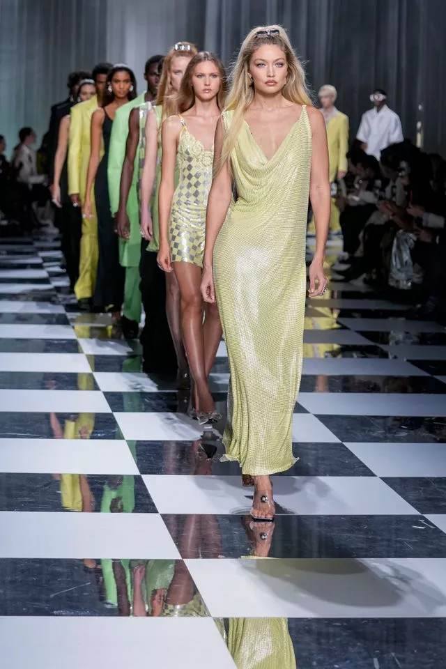 Gigi Hadid leads other models as they wear creations as part of the Versace women’s Spring Summer 2024 collection presented in Milan, Italy