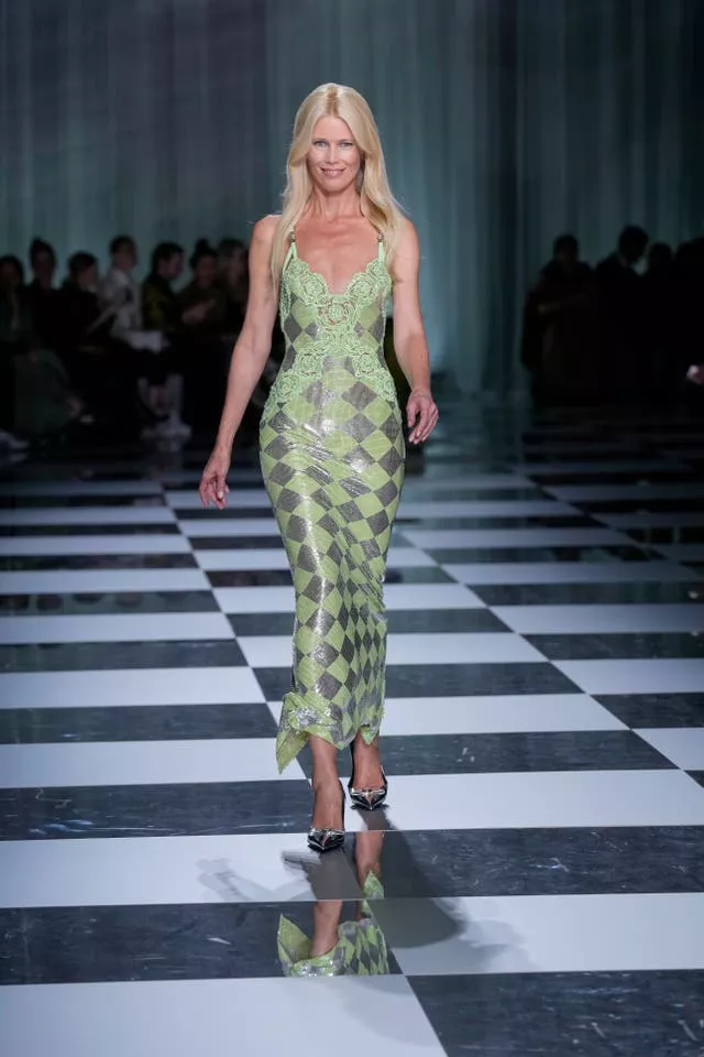 Claudia Schiffer wears a creation as part of the Versace women’s Spring Summer 2024 collection presented in Milan, Italy