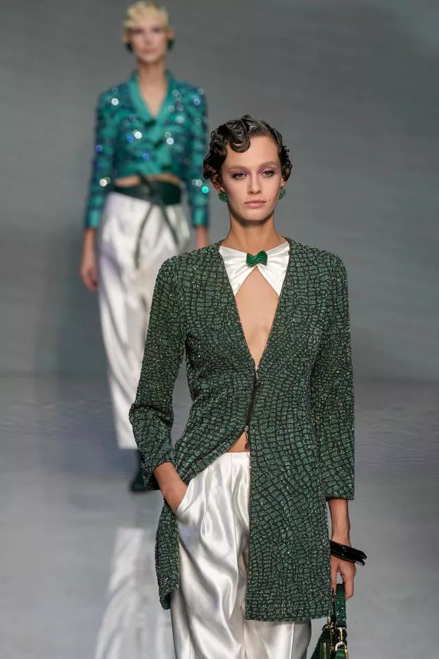 A model wears a creation as part of the Giorgio Armani women’s spring-summer 2024 collection, which was presented in Milan on Sunday