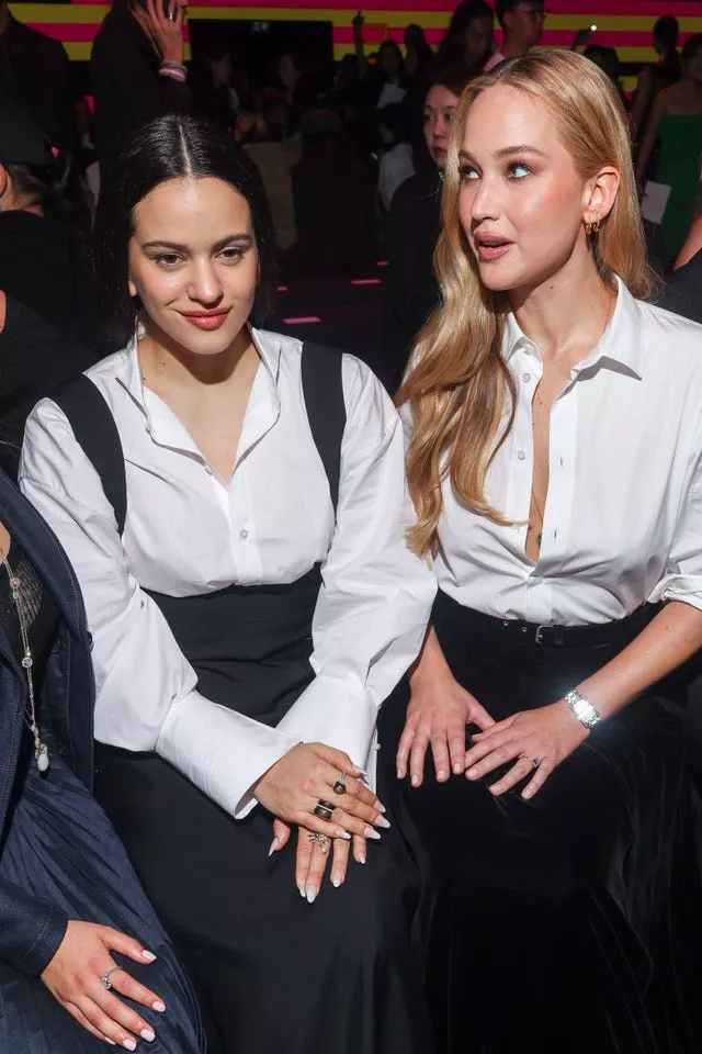 Rosalia (left) and Jennifer Lawrence attend the Christian Dior Spring/Summer 2024 womenswear collection presented Tuesday, Sept. 26, 2023 in Paris.