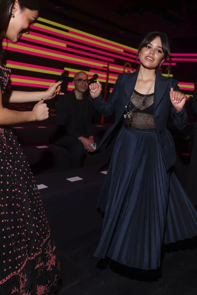 Jenna Ortega dances upon arrival to the Christian Dior Spring/Summer 2024 womenswear fashion collection presented Tuesday, Sept. 26, 2023 in Paris