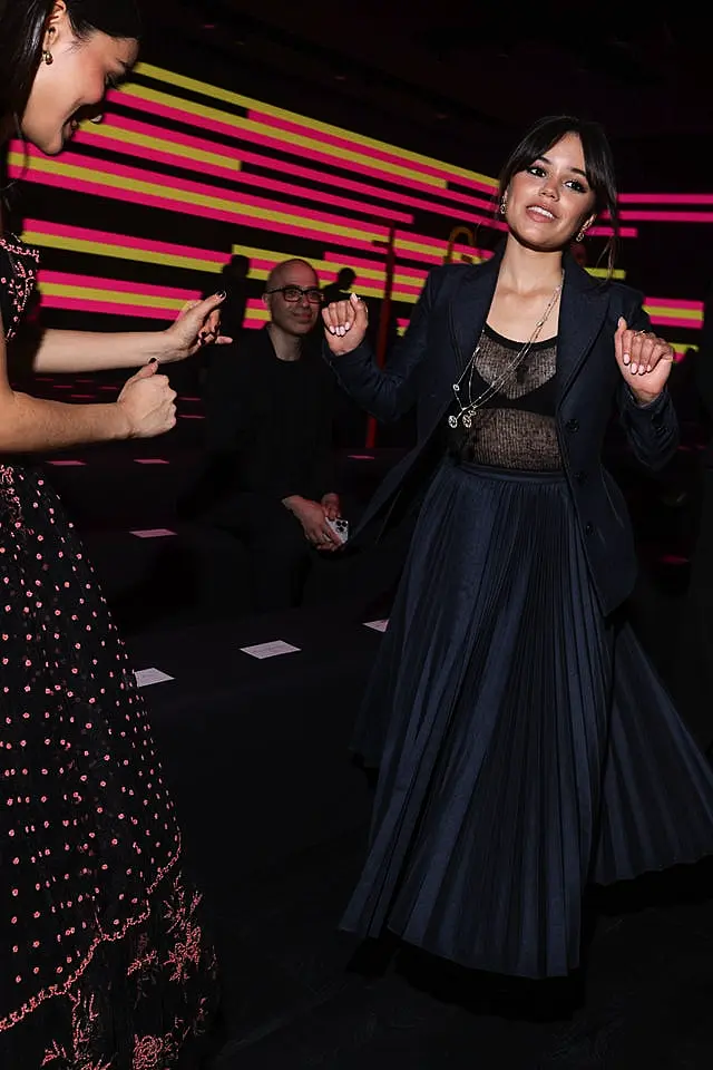 Jenna Ortega dances upon arrival to the Christian Dior Spring/Summer 2024 womenswear fashion collection presented Tuesday, Sept. 26, 2023 in Paris