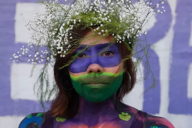 Demonstrador do México com pintura facial