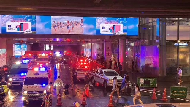 Ambulances outside an exit of the Siam Paragon shopping centre