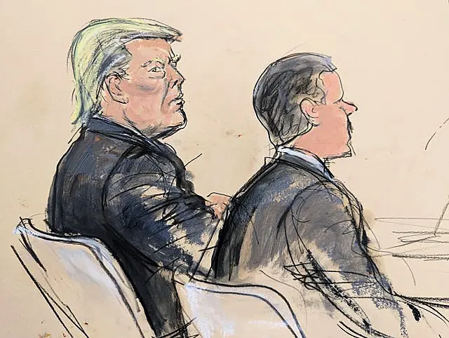 Courtroom sketch shows former Donald Trump, left, seated at the defence table next to his lawyer Christopher Kise