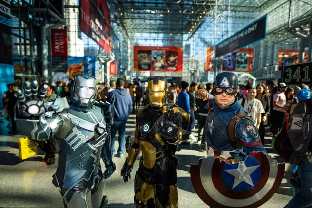People dressed as characters from The Avengers 