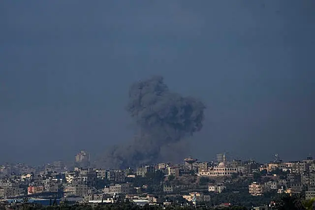 Smoke rises following an Israeli airstrike in the Gaza Strip, as seen from southern Israel, on Thursday