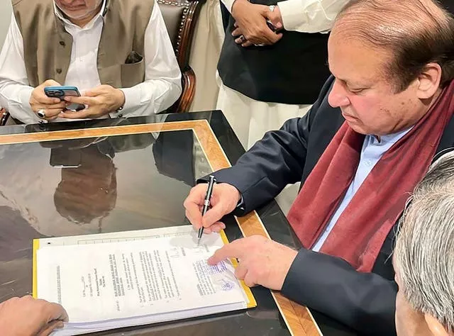 Nawaz Sharif signs documents
