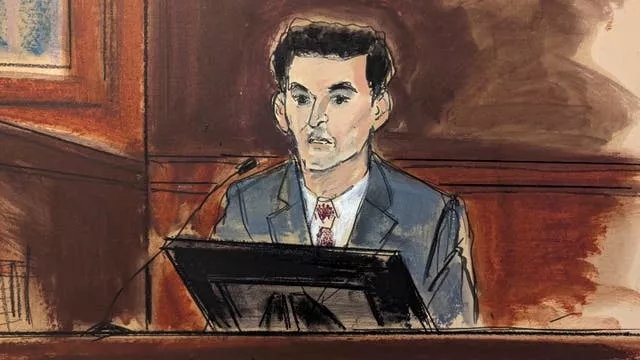 In this courtroom sketch, FTX founder Sam Bankman-Fried is questioned during his trial in Manhattan federal court on October 26 