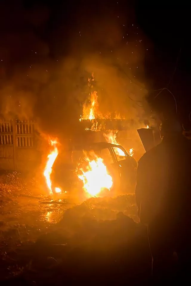A car burns in Kharkiv, Ukraine, on Friday November 3 after Russian drone attacks 