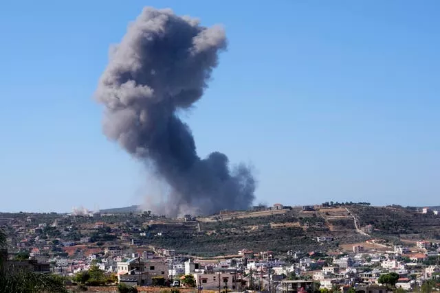 Black smoke can be seen following an Israeli air strike