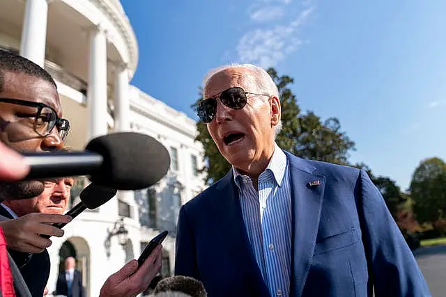 US President Joe Biden speaks to the media on the South Lawn of the White House