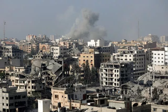 Smoke rises following Israeli airstrikes on Gaza City on Thursday