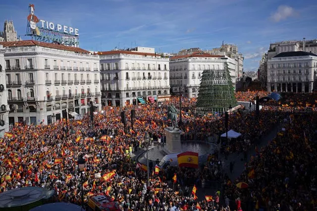 Crowds with Spanish flags packed the central Puerta del Sol during a protest called by Spain’s Conservative Popular Party in Madrid in November last year 