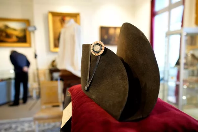 One of the signature broad, black hats that Napoléon wore when he ruled 19th-century France and waged war in Europe is on display at Osenat’s auction house in Fontainebleau, south of Paris