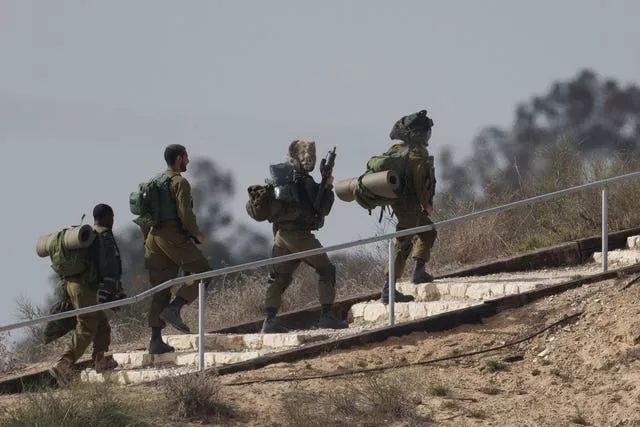 Israeli soldiers near the border with the Gaza Strip on Sunday