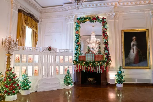 Holiday decorations adorn the East Room of the White House 