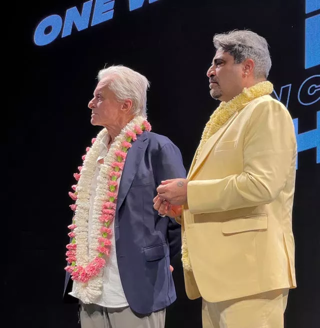 Hollywood actor and producer Michael Douglas and Indian film producer Shailendra Singh at a session on the last day of the 54th International Film Festival of India in Goa