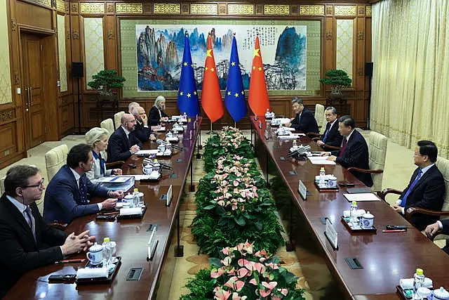 Chinese President Xi Jinping, second right, talks to European Commission president Ursula von der Leyen, third left, and European Council president Charles Michel, fourth left, during their meeting at the Diaoyutai State Guesthouse in Beijing 