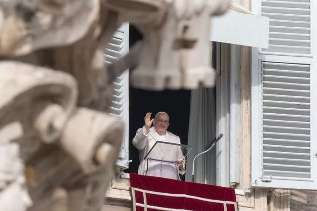 Pope Francis delivers a blessing at the Vatican 